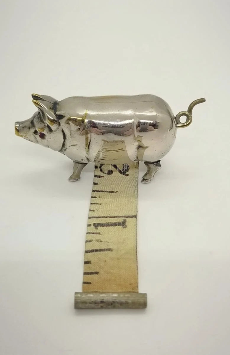PiggyMeasure – Antique Mini Tape Measure